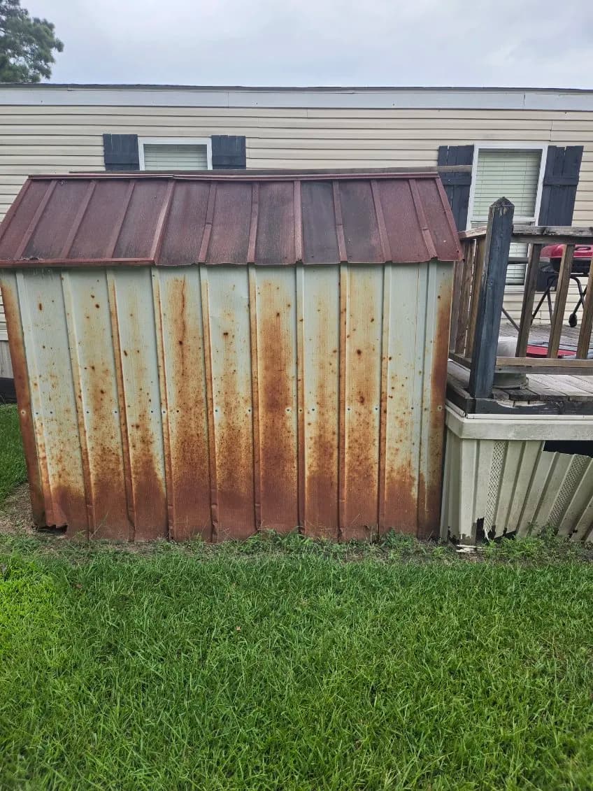 Rusted Metal Shed Demolition and Full Cleanout in Jackson MS image