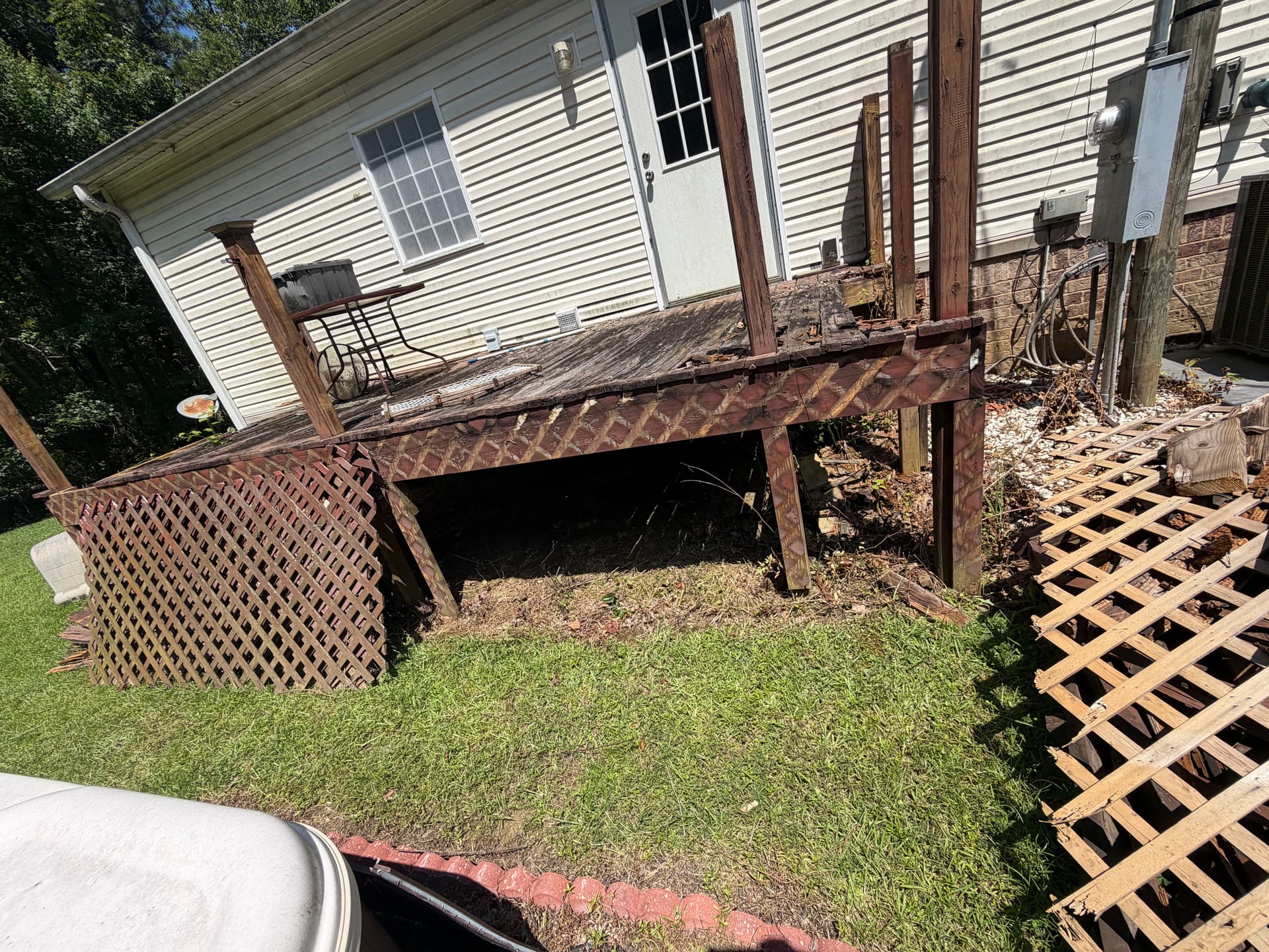 Hot Tub Removal and Deck Demo in Brandon MS image