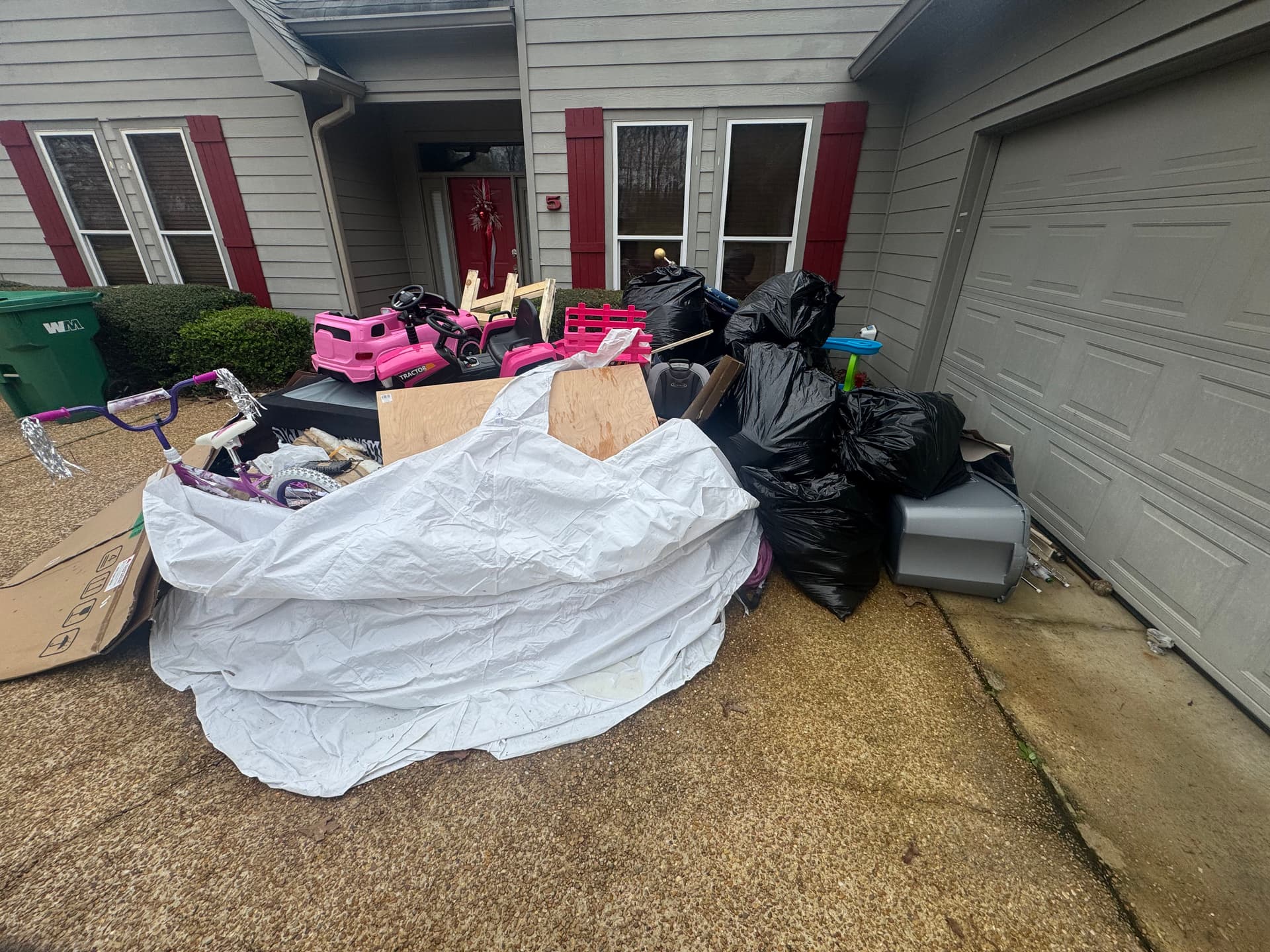 Full Property Cleanout Garage Driveway and Commercial Debris Gone image