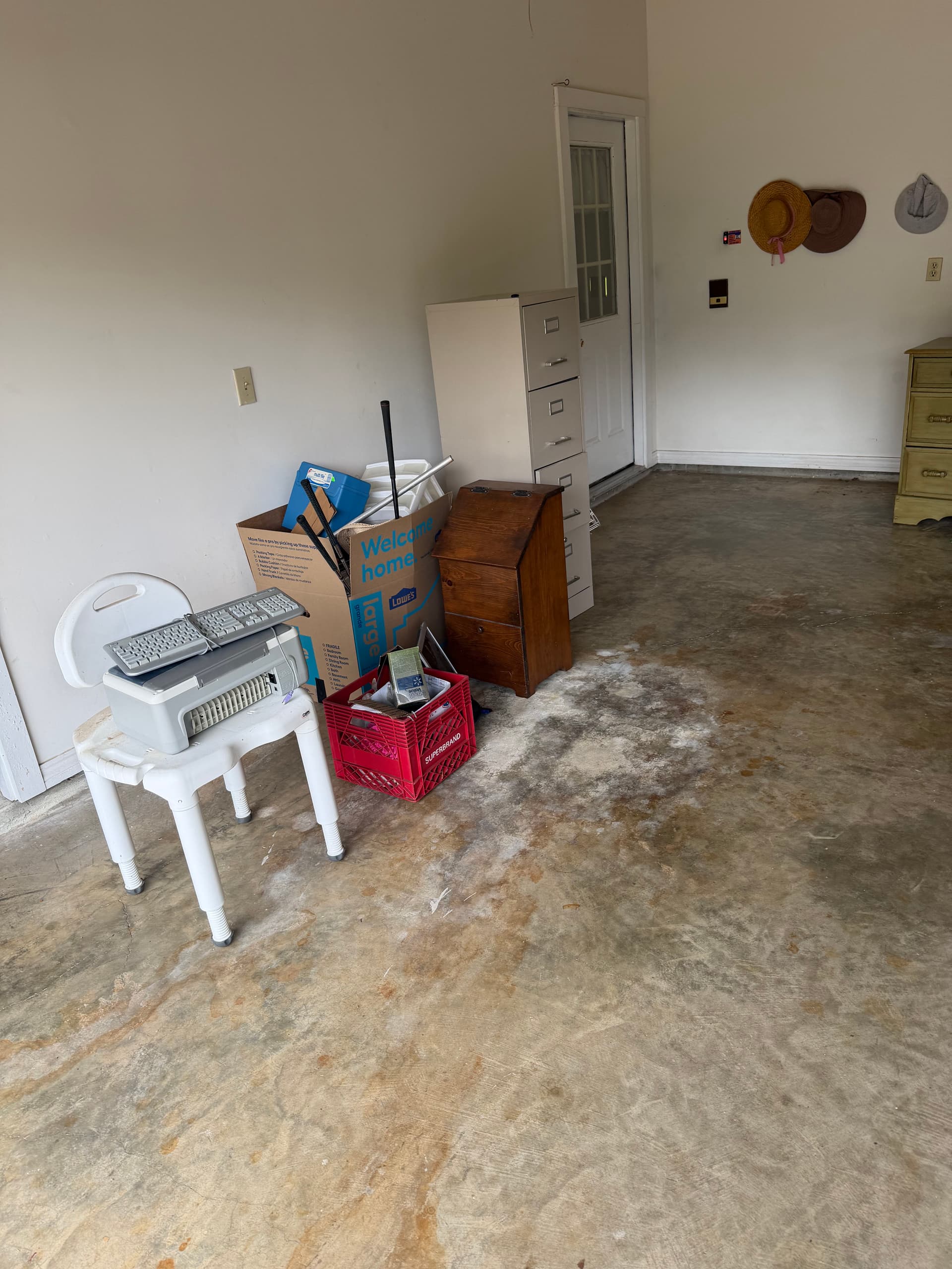 Gallery photos for Brandon Garage Clean Out Goes From Packed to Open Floor Space: Image #2