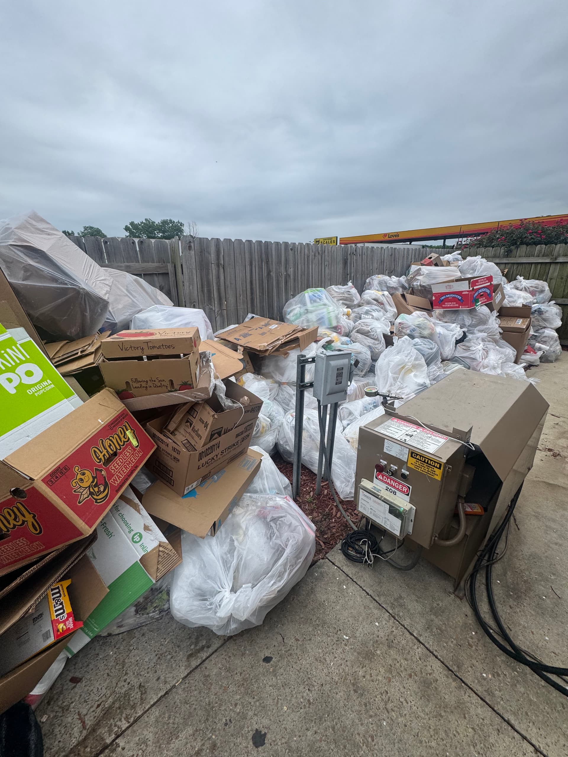 Gallery photos for Commercial Dumpster Enclosure Overflow Cleanout Done Right: Image #2