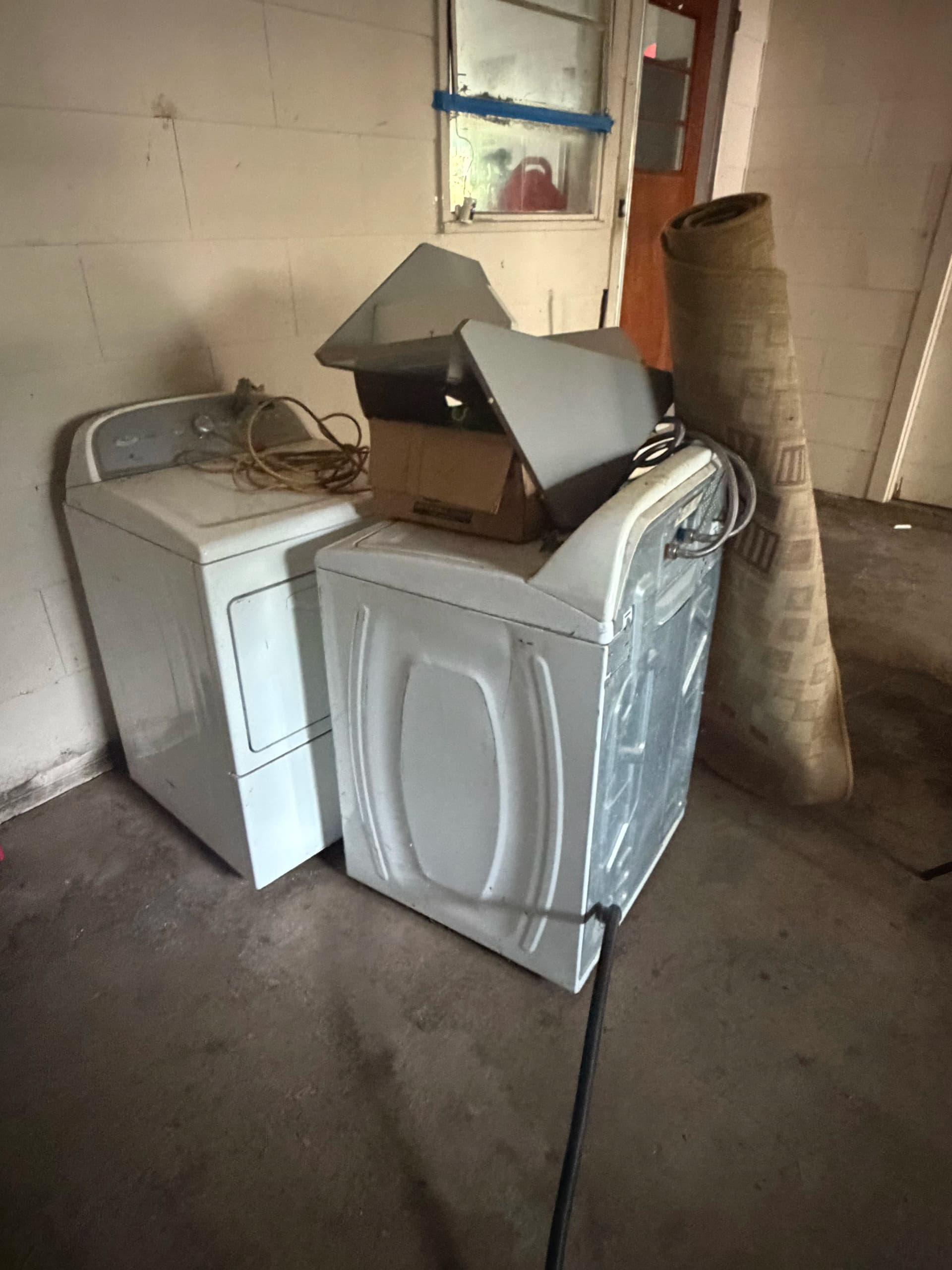 Washer and Dryer Removal from a Jackson MS Garage image