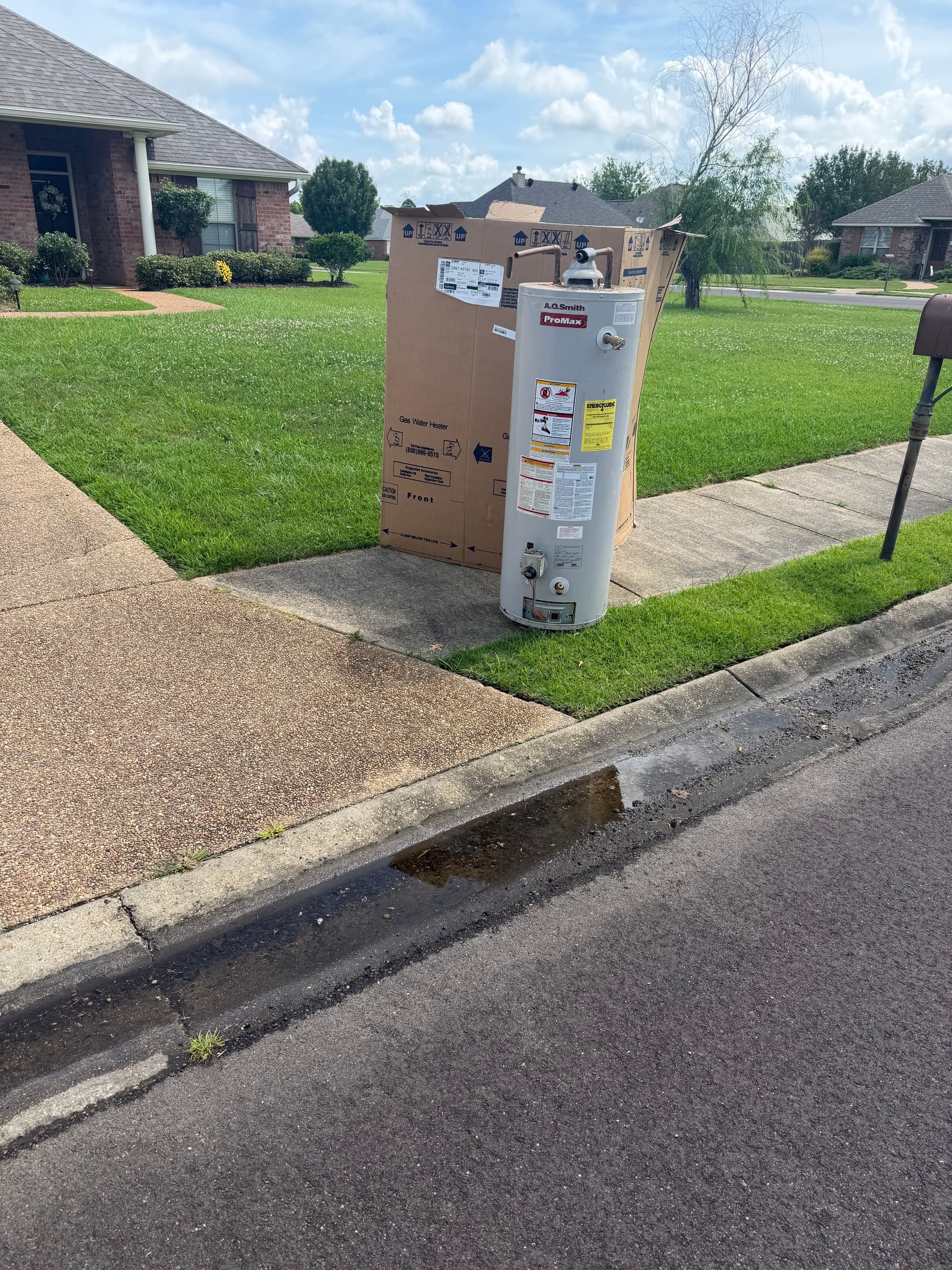 Old Water Heater and Packaging Hauled Away Clean image