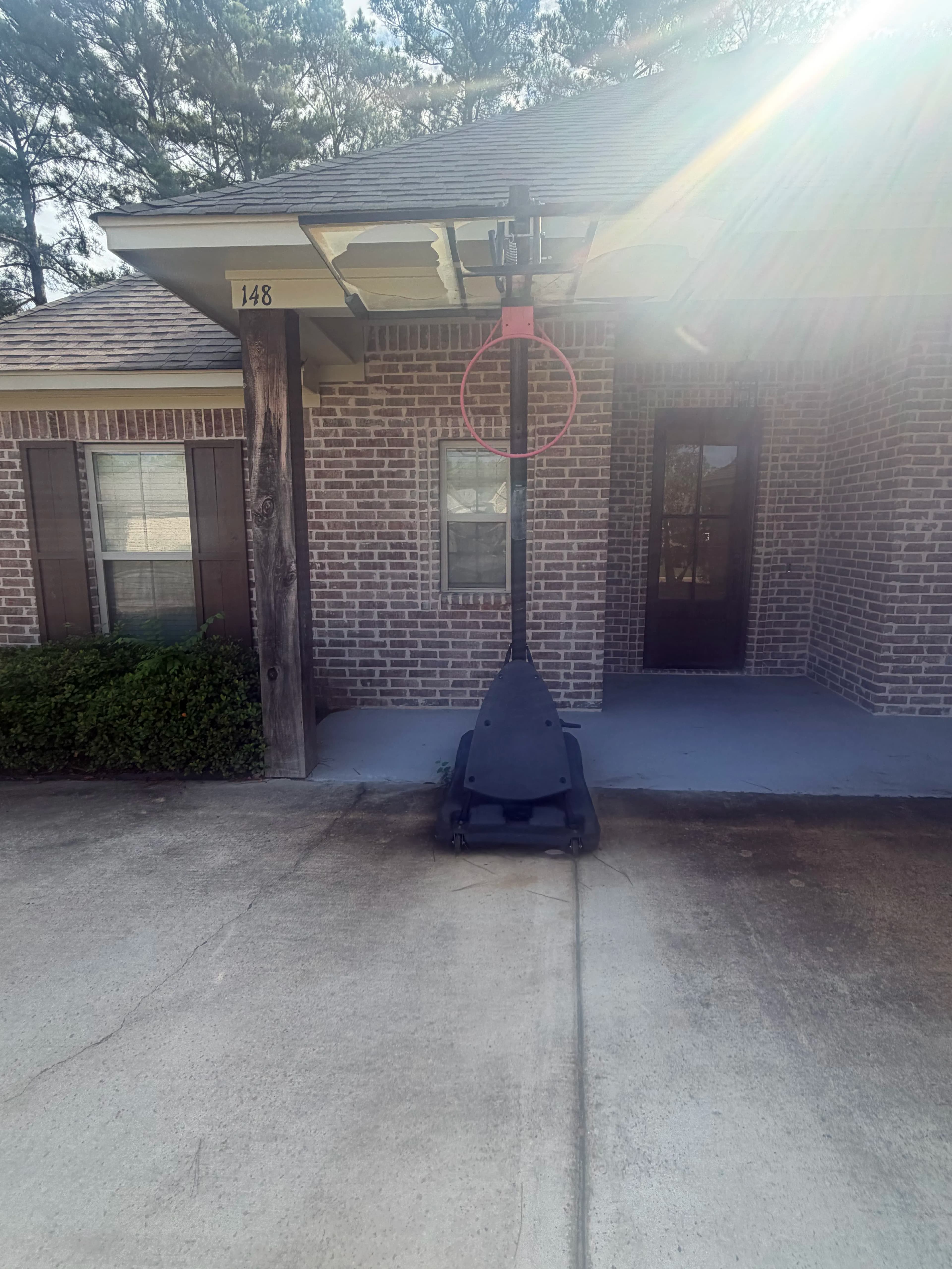 Project Old Basketball Goal Hauled Off a Brandon MS Driveway image