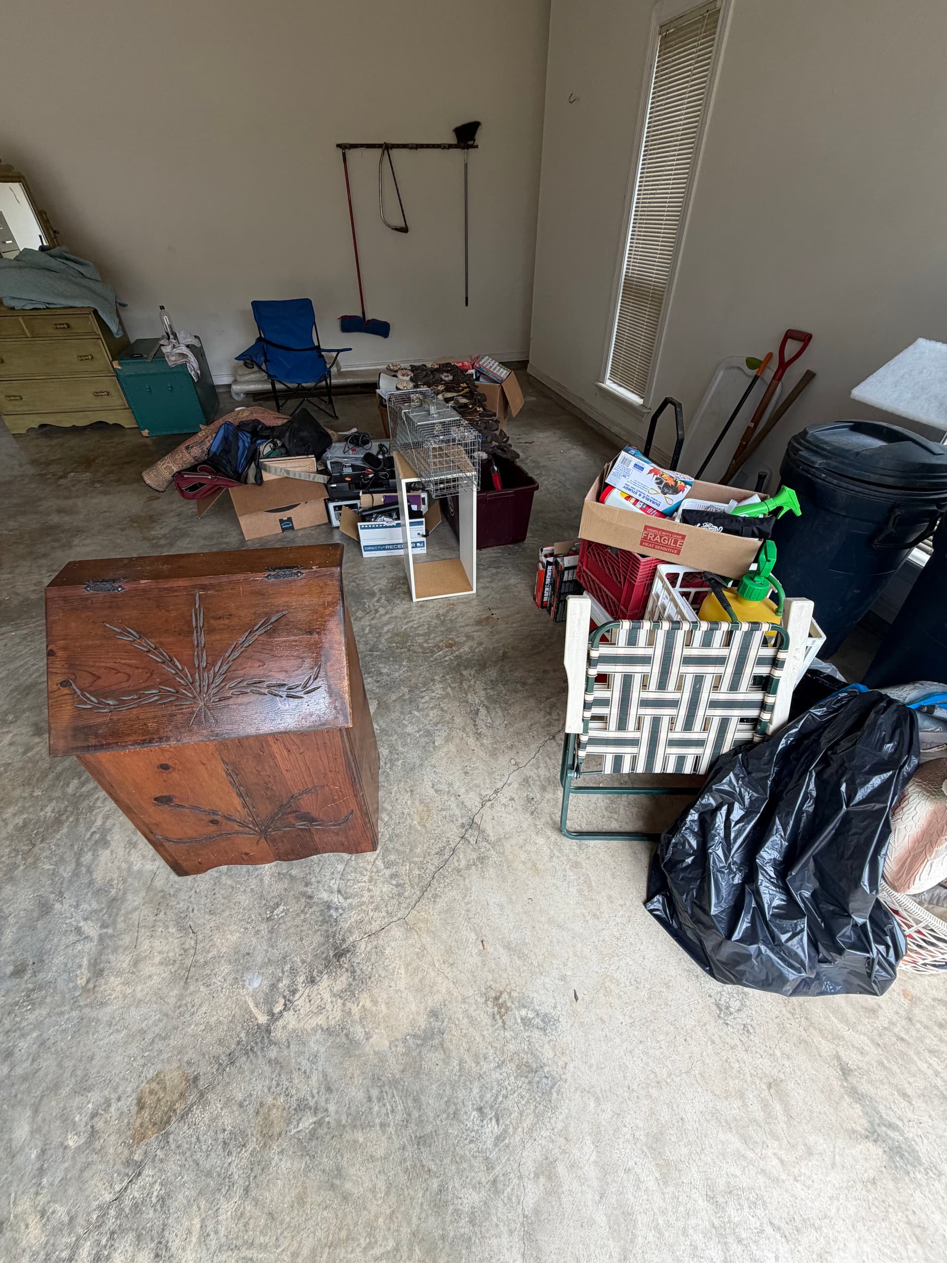 Brandon Garage Clean Out Goes From Packed to Open Floor Space image
